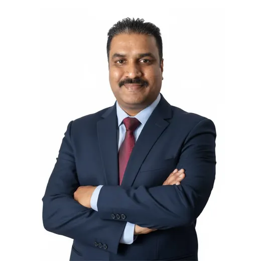 Portrait of Taiyakes Kesavan, Head of Contact Center